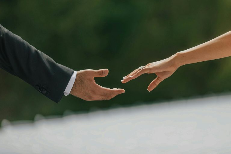 Bride and Groom Holding Hands