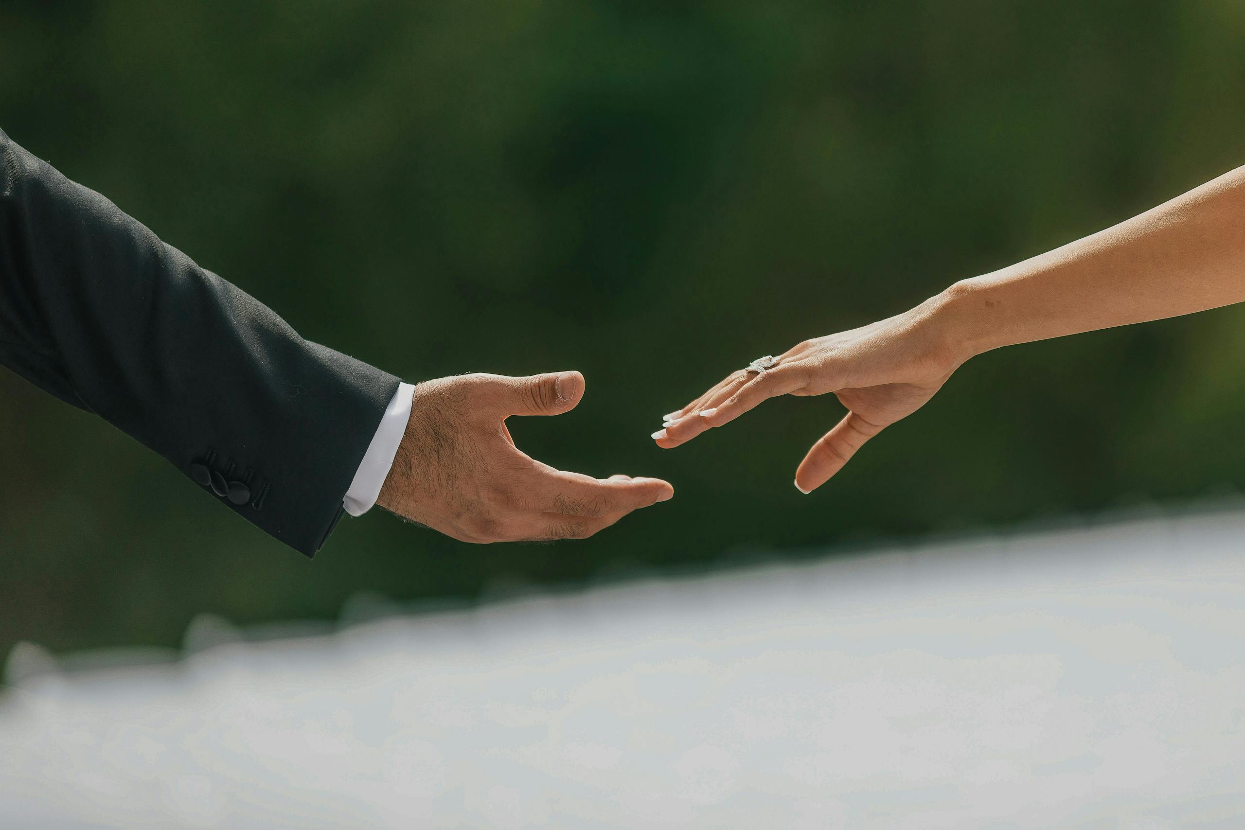 Bride and Groom Holding Hands